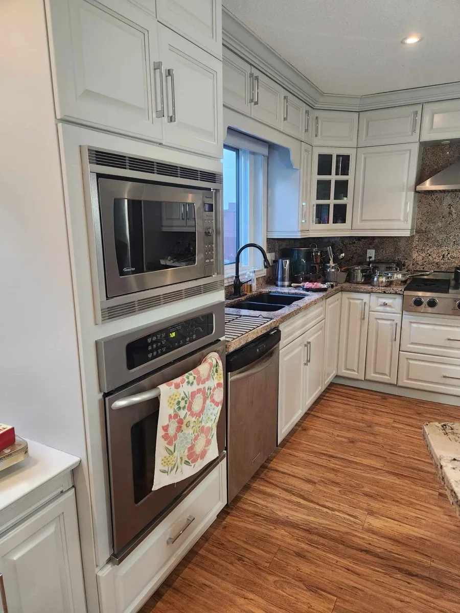 The same kitchen cabinets painted white