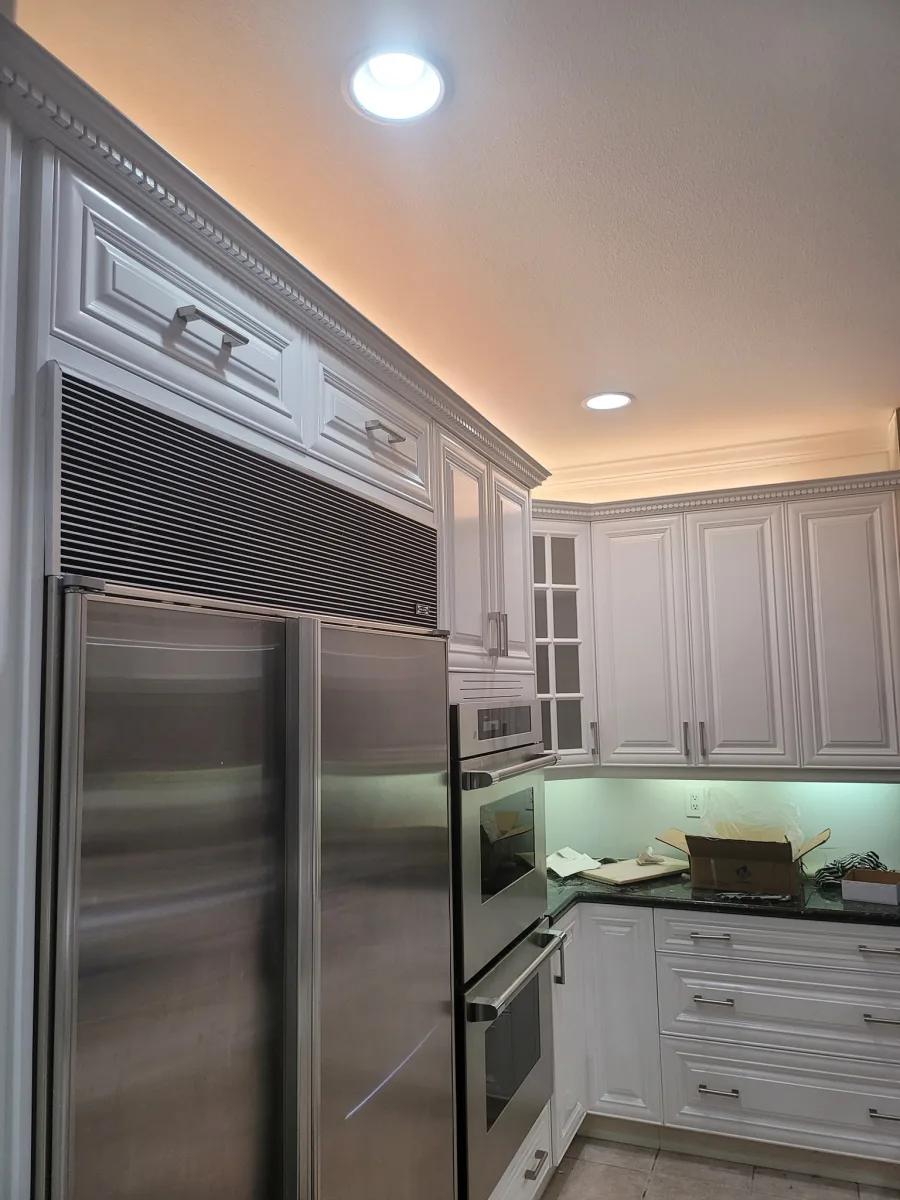 White painted kitchen cabinets by Johhan Painting