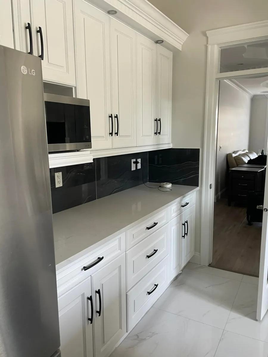 White painted kitchen cabinets by Johhan Painting